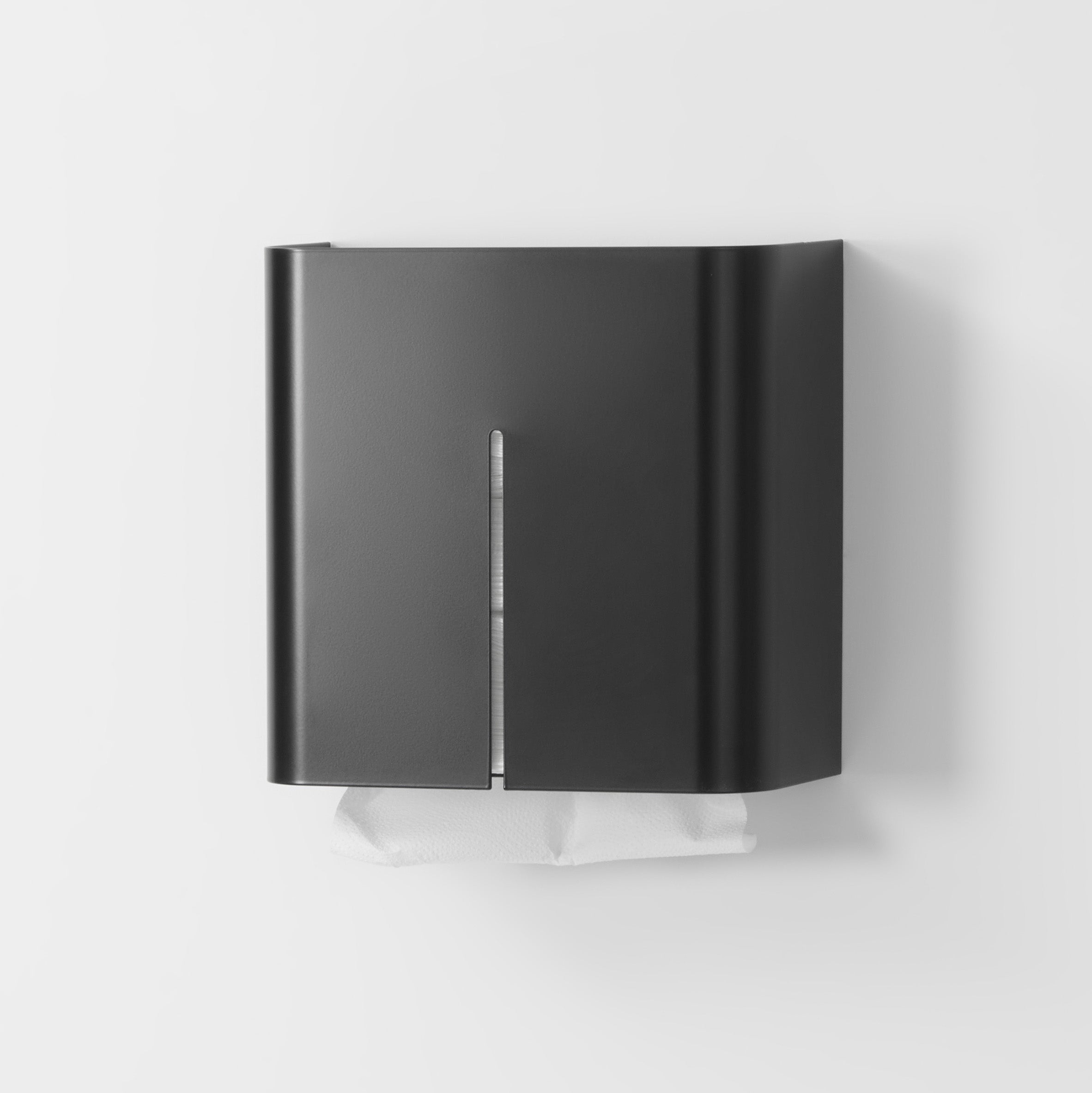 Moderner Papiertuchspender in mattem Schwarz, elegantes und zeitgemäßes Design, ideal für trendige und designorientierte Räume