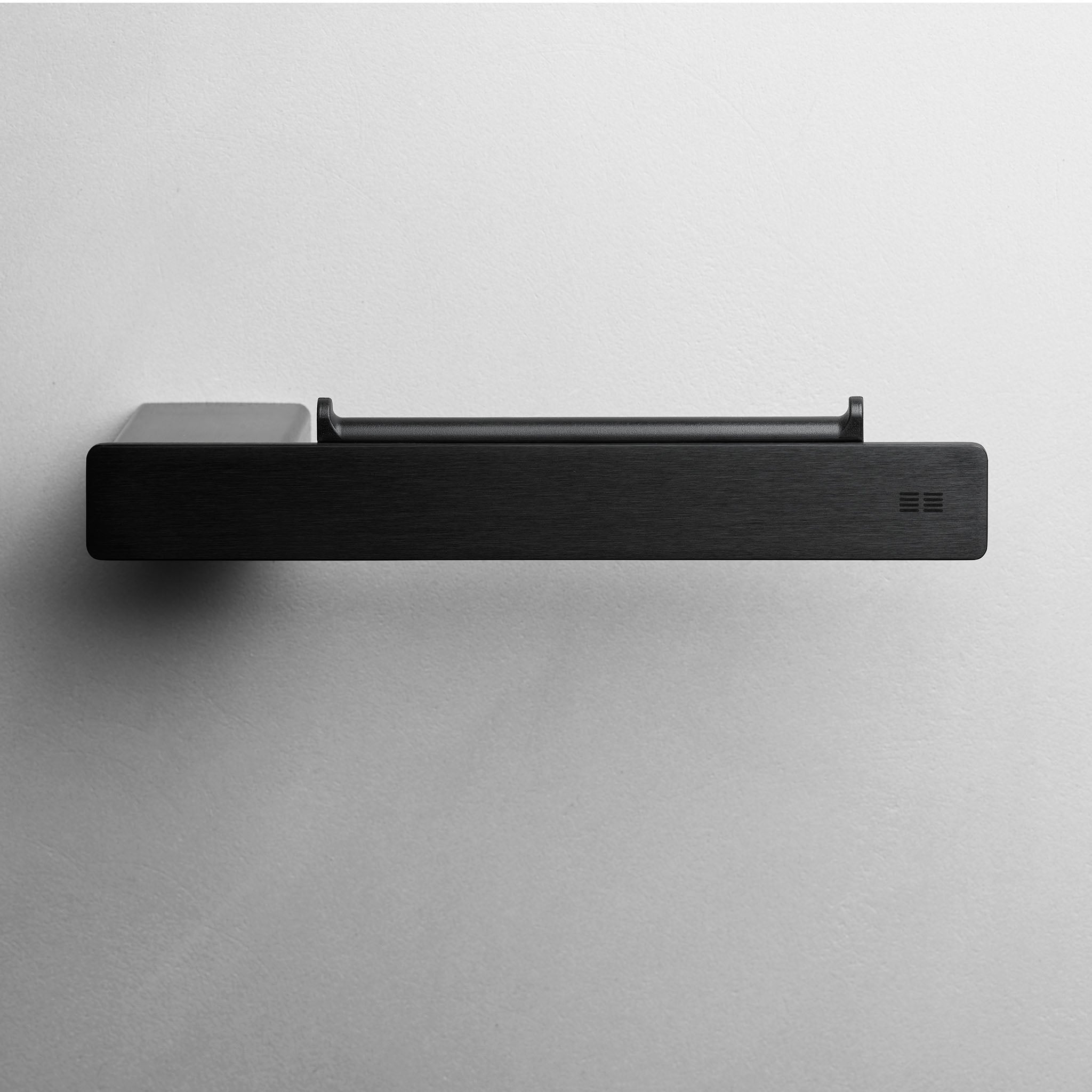 Moderner Toilettenpapierhalter in gebürstetem Schwarz mit magnetischem Clip – minimalistisches Accessoire für zeitgemäße Badezimmer.