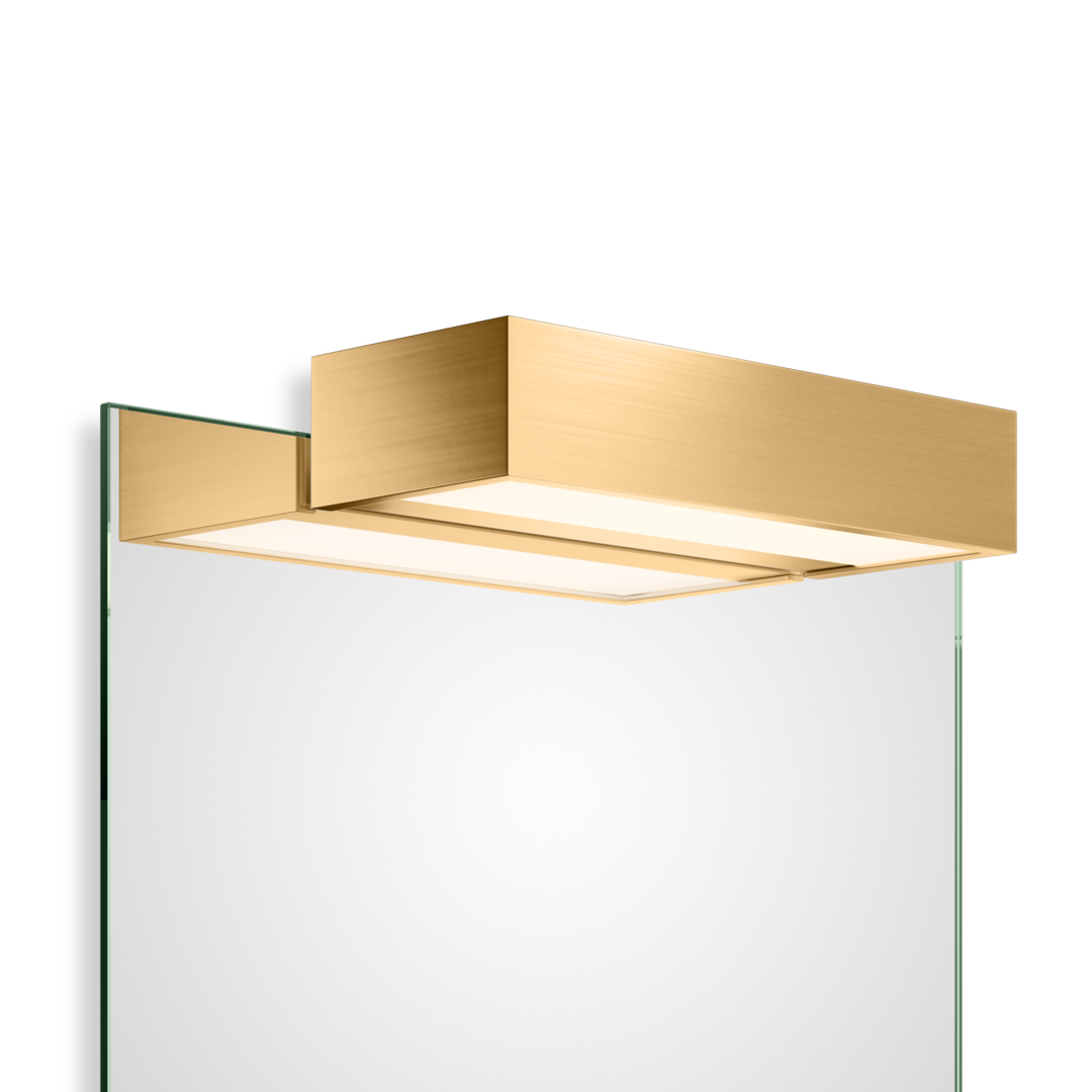Entdecken Sie die sanfte Eleganz der Decor Walther Box 25 in Gold matt für eine dezente Luxusbeleuchtung, verfügbar bei dasfeinebad.