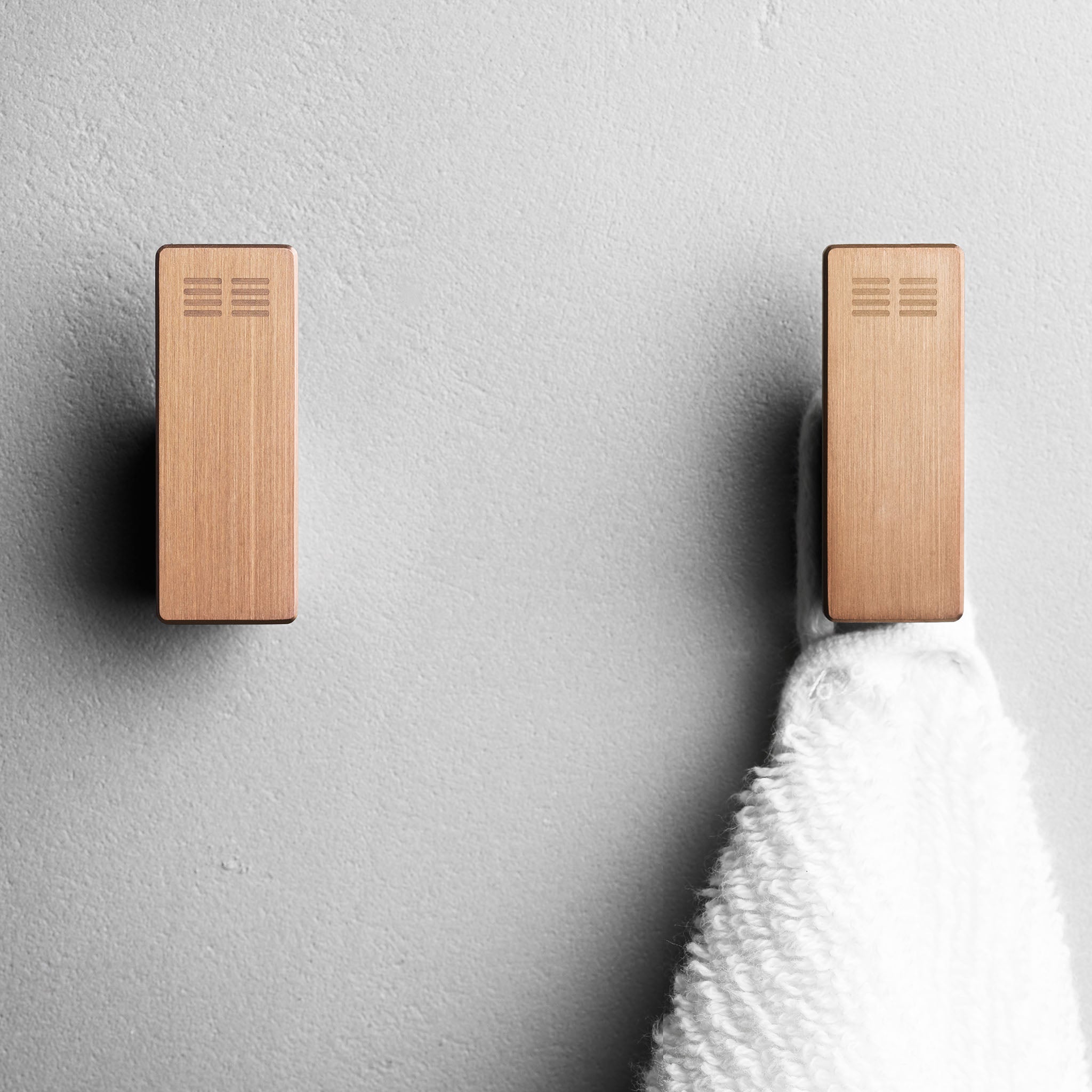 Design-Handtuchhaken in gebürstetem Kupfer – hochwertige Badhaken für Handtücher oder Gästehandtücher.