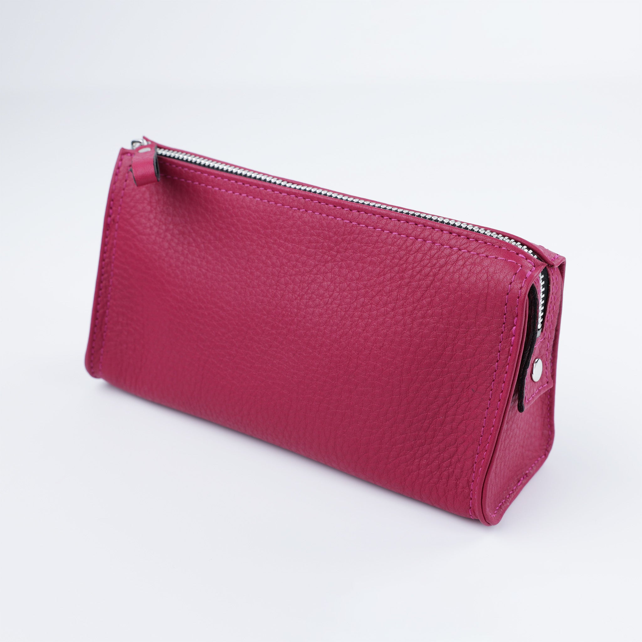 Fuchsiafarbene Kosmetiktasche aus weichem Leder von F. Hammann